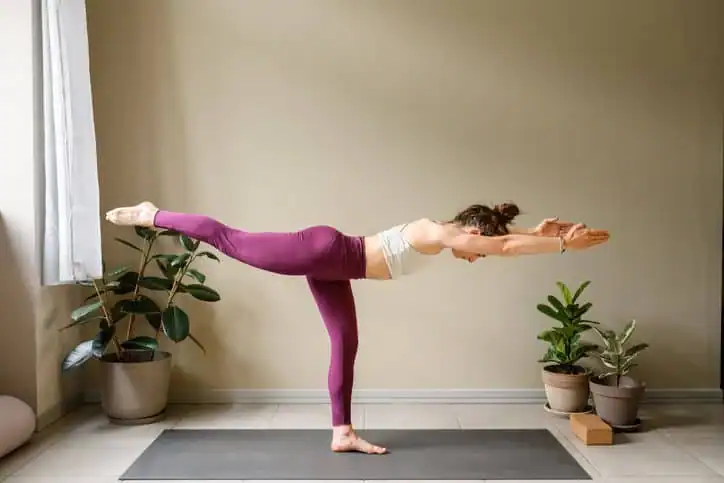 Achieving the Perfect Tone: How Often Should You Exercise for Results? 1 Woman doing Yoga exercise Rotherham to help with toning the body.